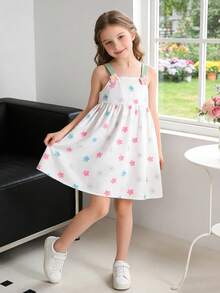 Đầm hai dây họa tiết hoa dễ thương, ngọt ngào dành cho bé gái, thích hợp mặc mùa xuân/hè, màu trắng, dây đeo vai được trang trí bằng hoa hồng, họa tiết hoa nhiều màu sắc trên đầm, dáng chữ A, chất liệu mềm mại và thoải mái, thời trang và đa năng cho mặc hàng ngày. - Nhiều màu - Xem 10