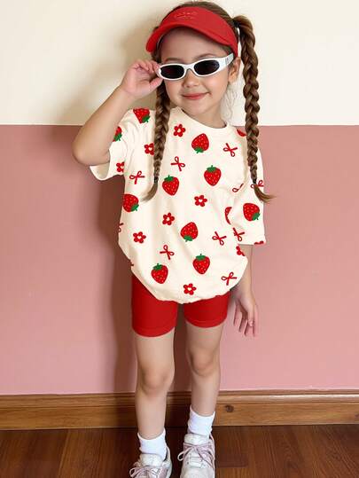 SHEIN Young Girls Cream White, Cute Sweet Girl Butterfly, Flower, Strawberry Print Loose Round Neck Short Sleeve T-Shirt And Tight Cycling Shorts Set, Suitable For Spring/Summer Daily, Holiday, Festival, Spring Vibes, Summer Vibes, Spring & Summer Outfits, Easy Comfort, Stylish Young Girl Set, Casual Wear, Kids Cute Strawberry Graphic T-Shirt Set, Spring & Summer Set, New Style, Chill Chill, Spring Vibes, Chill Summer, Vacay Vibes