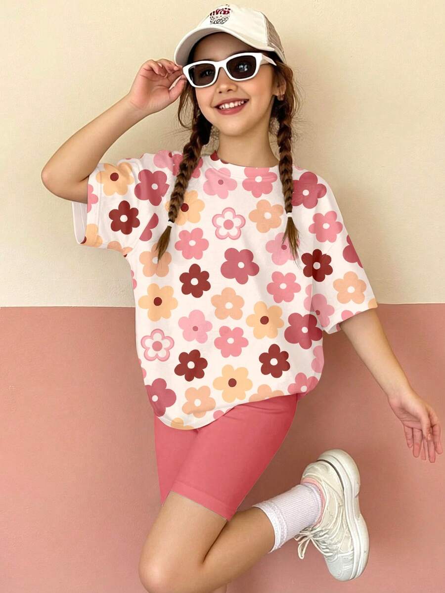 两件套少女休闲多巴胺粉色碎花宽松圆领短袖T恤和紧身骑行短裤套装,舒适柔软,适合春夏日常穿着、外出、度假、复活节等场合。 - 彩色 - 查看 1