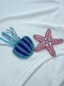 Rustia Áo tank top cỡ lớn, cổ chữ U, không tay, co giãn cao, họa tiết sao biển và sứa, kiểu dáng tối giản, bóng bẩy, thích hợp cho đi biển và hoạt động ngoài trời dành cho nữ. - trắng - Xem 7