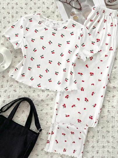 Conjunto de pijama para niñas preadolescentes, top de cuello redondo de manga corta con estampado floral minimalista y pantalones acanalados suaves y cómodos con dobladillo con volantes, 2 piezas