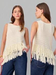 Nöista Áo dệt kim không tay có họa tiết chéo độc đáo với tua rua dài ở gấu áo. Màu kem nhẹ nhàng và thiết kế có chất liệu tạo nên vẻ ngoài boho-chic, hoàn hảo để mặc nhiều lớp hoặc phối cùng trang phục thường ngày. - Màu be - Xem 4