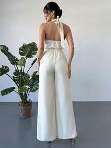 Firerie Bộ jumpsuit nữ thanh lịch với dây đeo vai mảnh và dây buộc phía sau, dáng rộng. - Màu be - Xem 4