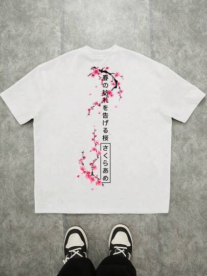 Manfinity ZONE917 T-shirt blanc ample à manches courtes avec imprimé fleurs de cerisier japonaises, style de rue. Convient pour le printemps/été, excellent cadeau pour les amis