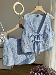 Comfortcana Bộ áo hai dây và chân váy ngắn màu xanh nhạt thêu hoa, thắt nơ phía trước dành cho nữ. - Màu xanh nhạt - Xem 4