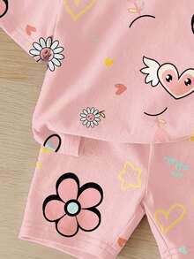 可爱涂鸦脸花卉爱心印花，少女休闲宽松圆领短袖T恤搭配修身骑行短裤套装，适合日常穿着、街头风、外出、居家、度假、返校、春夏等场合。 - 白色 - 查看 5