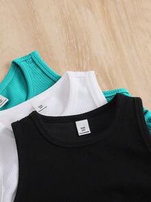 SHEIN Conjunto de 3 piezas para niña preadolescente: Top corto casual de punto de cuello alto ajustado de unicolor - Multicolor - Ver 5