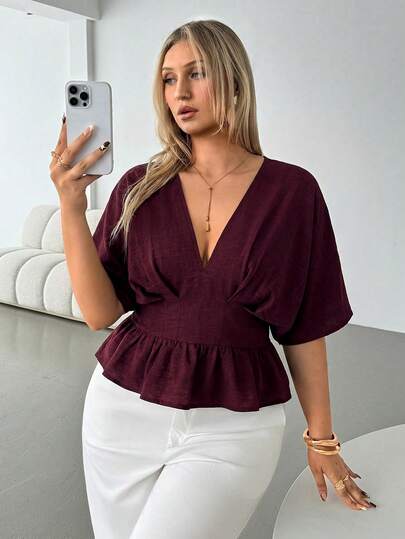 Auralis Blusa de talla grande para mujer con cuello en V profundo, mangas tipo murciélago y unicolor, de corte ajustado y con estilo