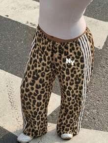 Muchica Quần thể thao nữ phong cách tối giản, họa tiết da báo, in khẩu hiệu NY, viền tương phản, thích hợp cho các hoạt động thể thao, thi đấu, lễ hội âm nhạc, kỳ nghỉ, phong cách đường phố, mùa tốt nghiệp. - Nhiều màu - Xem 4