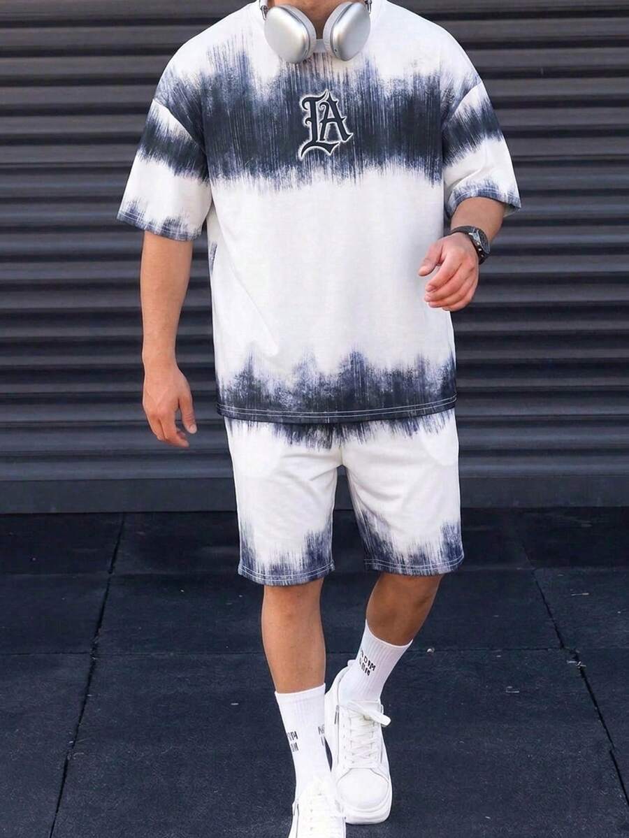 SHEIN 男童宽松街头扎染渐变图案圆领短袖短裤套装,适合秋季、春季、夏季穿着,适合日常穿着、户外玩耍、运动、上学、街拍、聚会和居家休闲。 - 白色 - 查看 1