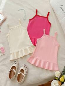 SHEIN Vintaside Kids 这款女童三件套吊带连衣裙，柔软舒适，简约清新，色彩缤纷，是夏季的理想之选。款式甜美俏皮，充满童趣。采用厚度适中的针织面料，A字鱼尾裙摆，饰以水果印花图案，荷叶边裙摆更添灵动可爱。适合日常外出、亲子活动、亲子装扮、居家休闲、参加派对和夏季花园聚会等各种场合。 - 彩色 - 查看 2