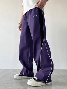 Manfinity EMRG Pantalon droit décontracté pour hommes avec cordon de serrage et blocs de couleurs, pantalon de survêtement droit ample et patchwork noir pour le football en extérieur - Prune - Voir 5