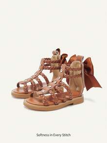 Cozy Pixies Một đôi sandal đế bằng kiểu La Mã dễ thương, đa năng, mang phong cách bohemian, lý tưởng cho kỳ nghỉ hè, thích hợp cho bé gái, kiểu dáng giản dị, thoải mái, có nơ và đan, thích hợp đi biển. - màu nâu - Xem 5