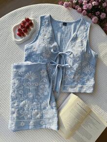 Comfortcana Bộ áo hai dây và chân váy ngắn màu xanh nhạt thêu hoa, thắt nơ phía trước dành cho nữ. - Màu xanh nhạt - Xem 7