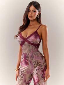 Radiana Bộ jumpsuit nữ gợi cảm, độc đáo với viền ren màu tím đỏ, họa tiết da báo, da rắn, dáng ôm, ống rộng, xuyên thấu, phù hợp cho các hoạt động thường ngày, buổi tối, tụ họp, hẹn hò, tiệc tùng, câu lạc bộ, vũ trường, lễ hội, lễ hội âm nhạc, lễ hội nhạc điện tử, buổi hòa nhạc, kỳ nghỉ, bãi biển, du lịch. - Nhiều màu - Xem 5
