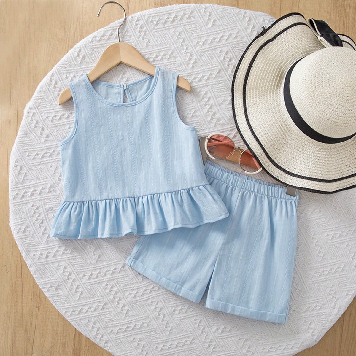 Conjunto de 2 piezas para niña con top sin mangas de cuello redondo de unicolor tejido y shorts sueltos de unicolor tejido