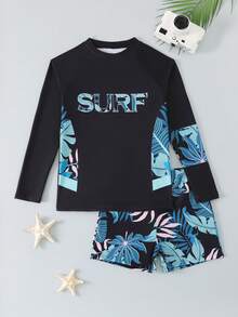 SHEIN 男童泳装，酷炫冲浪风，纯黑色，正面饰有渐变蓝色“SURF”字母印花，插肩袖，侧边热带花卉印花，两件套，针织面料，时尚休闲，适合游泳、夏季度假、海滩、泳池派对等场合。 - 黑色 - 查看 5