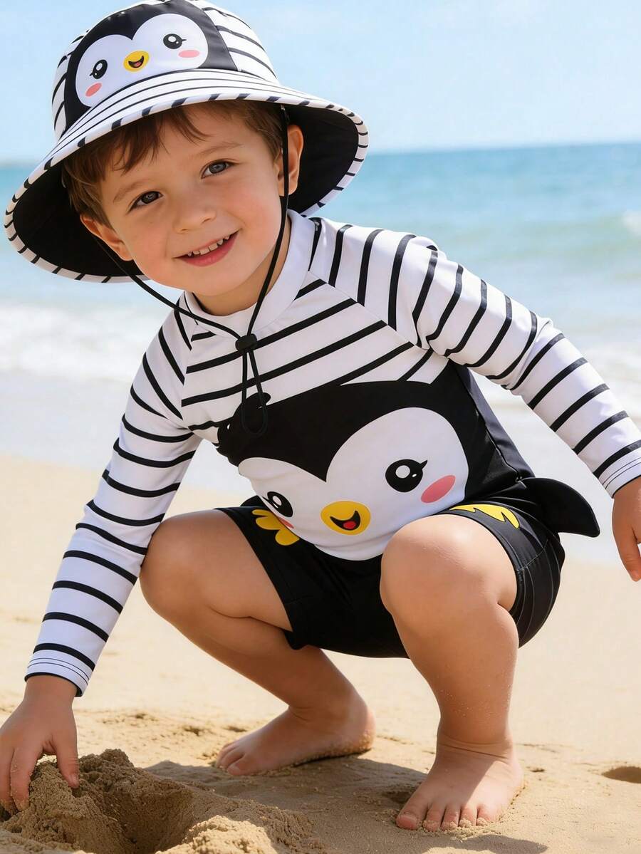 SHEIN Conjunto de camiseta de protección solar y pantalones cortos de baño con estampado de pingüino lindo para bebé niño - Multicolor - Ver 1