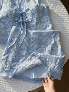 Comfortcana Bộ áo hai dây và chân váy ngắn màu xanh nhạt thêu hoa, thắt nơ phía trước dành cho nữ. - Màu xanh nhạt - Xem 6