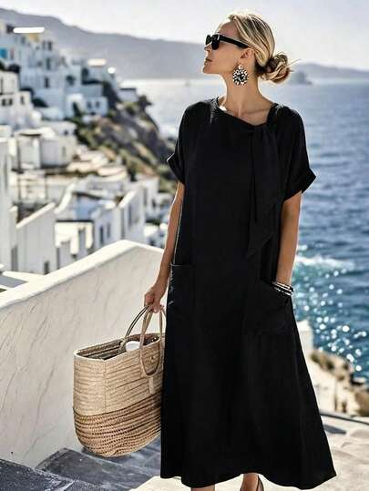 Breezaya Đầm maxi vải nhăn mới về năm 2026 - Cổ tròn, tay ngắn, vai rớt, dáng rộng với chi tiết thắt nơ, phong cách công sở tối giản, đi nghỉ mát, màu Dopamine, xanh băng, thanh lịch tự nhiên.