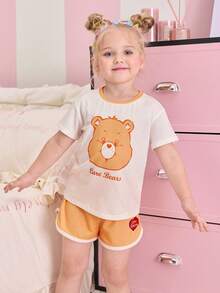 SHEIN X Care Bears 卡通印花圆领短袖上衣和撞色滚边短裤睡衣套装，适合年轻女孩 - 黃色 - 查看 7