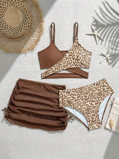 SHEIN 3pcs/Set Tween Girls Swimsuit With Random Print Mesh Skirt,Brown Leopard Print Patchwork Cross Design Cami Top + Mesh Drawstring Skirt + High-Waisted Briefs Kids Quick-Drying Breathable Vacation Swimwear Brown Beach Skirt Brown Swim Skirt Brown Cover Up Skirt Brown Cover Up Swimwear Brown Cover Up Bathing Suit