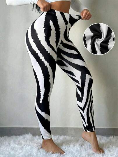 SHEIN SXY Leggings de cebra de moda para tallas grandes