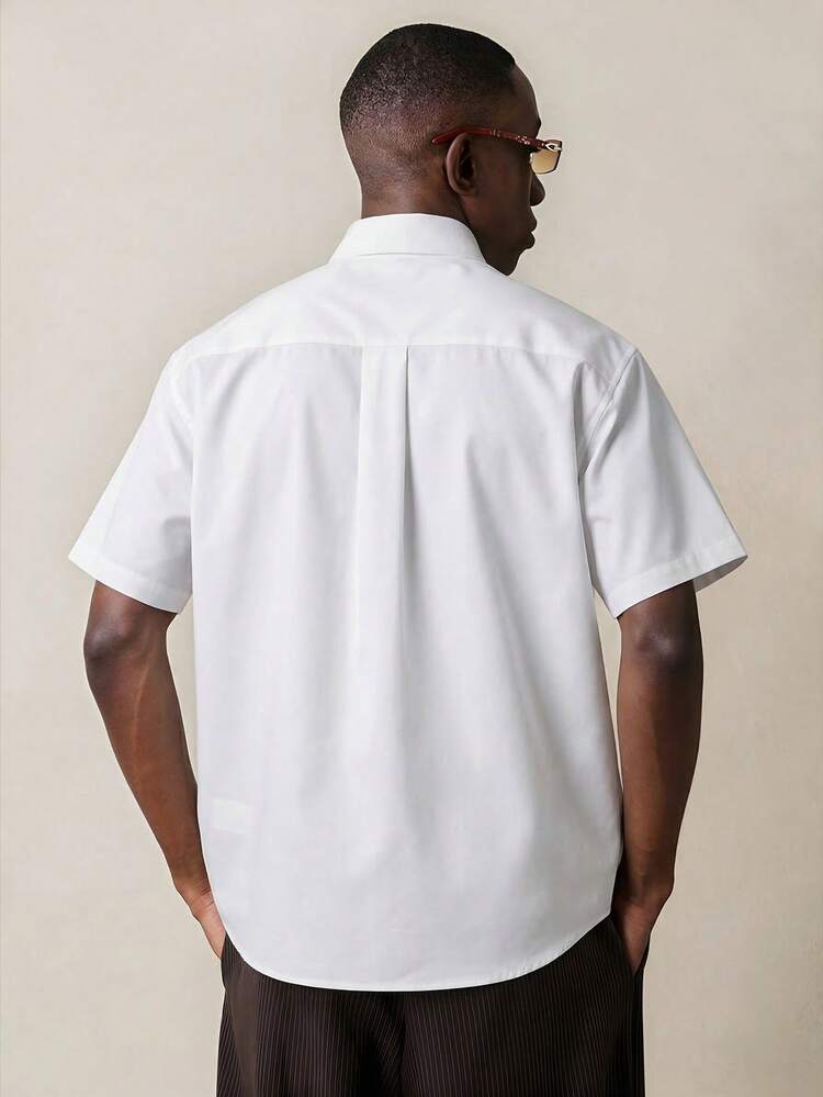 Koszula z krótkim rękawem i kieszenią zapinana na guziki