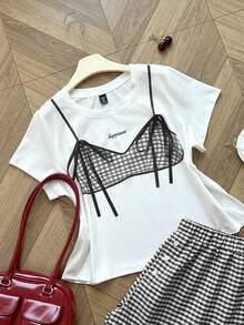 Conjunto de 2 piezas de Playera con cuello redondo y estampado de moño talla extra + Shorts con estampado a cuadros y cintura elástica - Blanco y Negro - Ver 4