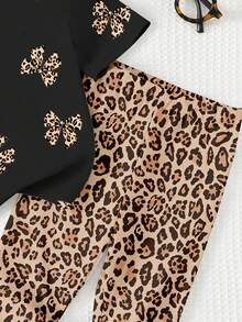 黑色可爱甜美豹纹蝴蝶结印花，豹纹图案，少女休闲简约柔软舒适圆领宽松短袖T恤和打底裤套装，适合日常穿着、街头风、外出、居家、度假、返校、春夏女童装，轻松舒适，春夏女童套装，时尚女童，休闲装，女童动物豹纹图案T恤套装，春夏时尚，休闲风格，轻松别致，休闲氛围 - 彩色 - 查看 6