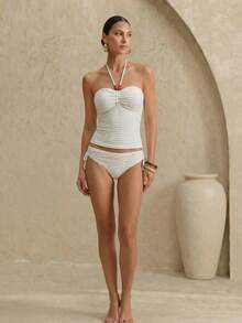 Anewsta Bộ bikini hai dây màu nâu đính hạt cườm, kiểu dáng thanh lịch, thích hợp cho kỳ nghỉ hè, bikini đi biển mùa xuân/hè dành cho nữ, trang phục hè 2026, váy đi biển, trang phục đi biển cho nữ, trang phục nghỉ hè thanh lịch, trang phục đi nghỉ mát cho nữ, bộ bikini cổ yếm đính hạt cườm bằng vải jacquard, đồ bơi nữ mới về mùa xuân/hè 2026, phù hợp cho đi học, kỳ nghỉ, hẹn hò, trà chiều, phong cách miền Tây, du thuyền, bãi biển, đảo, du lịch đường bộ, mọi mùa, lễ hội âm nhạc, kỳ nghỉ Boho, kỳ nghỉ Bohemian, mùa thu thư giãn, phong cách Boho miền Tây, áo kiểu thanh lịch cho nữ, áo quây trắng, áo ống, bộ bikini, áo ống, bộ đồ bơi cạp cao, bikini cạp cao màu trắng, bộ đồ bơi hai mảnh màu trắng, tankini trắng, áo ống trắng, trang phục đi biển màu trắng cho nữ. - Màu be - Xem 3
