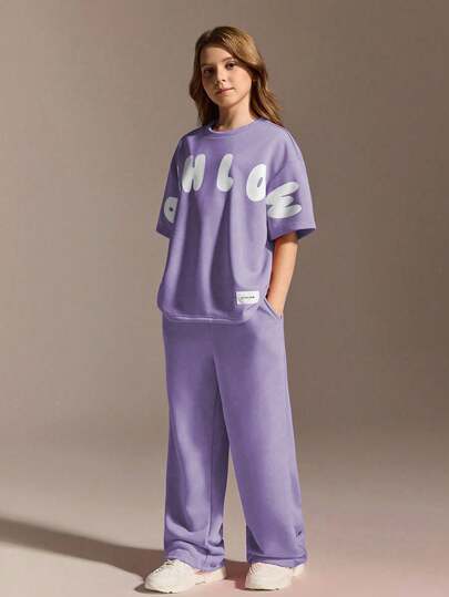 SHEIN Sparklyn Ensemble sport décontracté pour filles, t-shirt oversize à col rond ample assorti à un pantalon ample, la couleur orange-rose vibrante dégage une vigueur juvénile, tissu doux et agréable à la peau, convient pour le port quotidien décontracté, l'école et les vacances