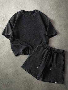 Manfinity Roghcode Herren Lässiges, strukturiertes, locker sitzendes Kurzarm T-Shirt und Shorts mit Kordelzug, modischer Street-Style für den täglichen Gebrauch, Sommer - Schwarz - Übersicht 1