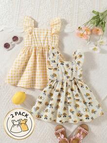 SHEIN Set de 2 vestidos de verano sin mangas con botones y estampado floral para niñas bebé - Amarillo - Ver 2