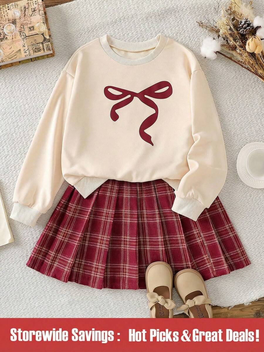 SHEIN 2pcs/Set Fashionable Casual School Style Girls' Apricot Knit Pullover With Bow Print And Red Plaid Pleated Mini Skirt Outfit, Suitable For Outdoor, Travel, Street Style, Daily Casual, Home, Trip, School Season, Daily Matching - Multicolor - View 1
