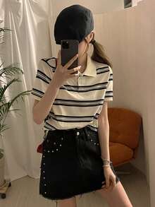 Áo thun nữ tay ngắn cổ polo kẻ sọc in hình. - Đen và trắng - Xem 7