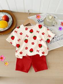 SHEIN 奶油白，可爱甜美女孩蝴蝶结、花朵、草莓印花，女婴休闲柔软宽松圆领短袖T恤搭配紧身骑行短裤，适合春夏日常、假期、节日穿着，营造春日氛围和夏日气息，春夏套装，轻松舒适，时尚女婴套装，休闲装，儿童可爱草莓图案T恤套装，春夏套装，新款，轻松休闲，春日氛围，夏日休闲，度假氛围 - 彩色 - 查看 3