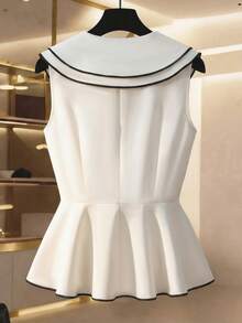 Franclia Áo kiểu nữ thanh lịch phong cách quý phái Pháp mùa xuân hè mới, phối đen trắng tương phản, cổ áo thủy thủ, không tay, vạt áo peplum ôm eo, kiểu áo vest công sở trang nhã. - trắng - Xem 2