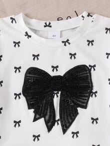 SHEIN 女童（小号）T恤套装，夏季品牌女童韩版宽松小众可爱露脐上衣两件套，夏季蝴蝶结黑白印花休闲日常装 - 黑色 - 查看 7