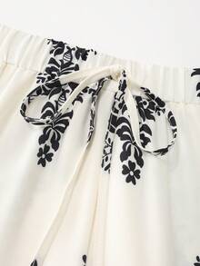 GlowEve Women's Fashionable Elegant Printed Elastic Waist Drawstring Black & White Floral Pattern Loose Fit Casual, Vacation, Commute Long Pants, Spring/Summer - Multicolor - View 6