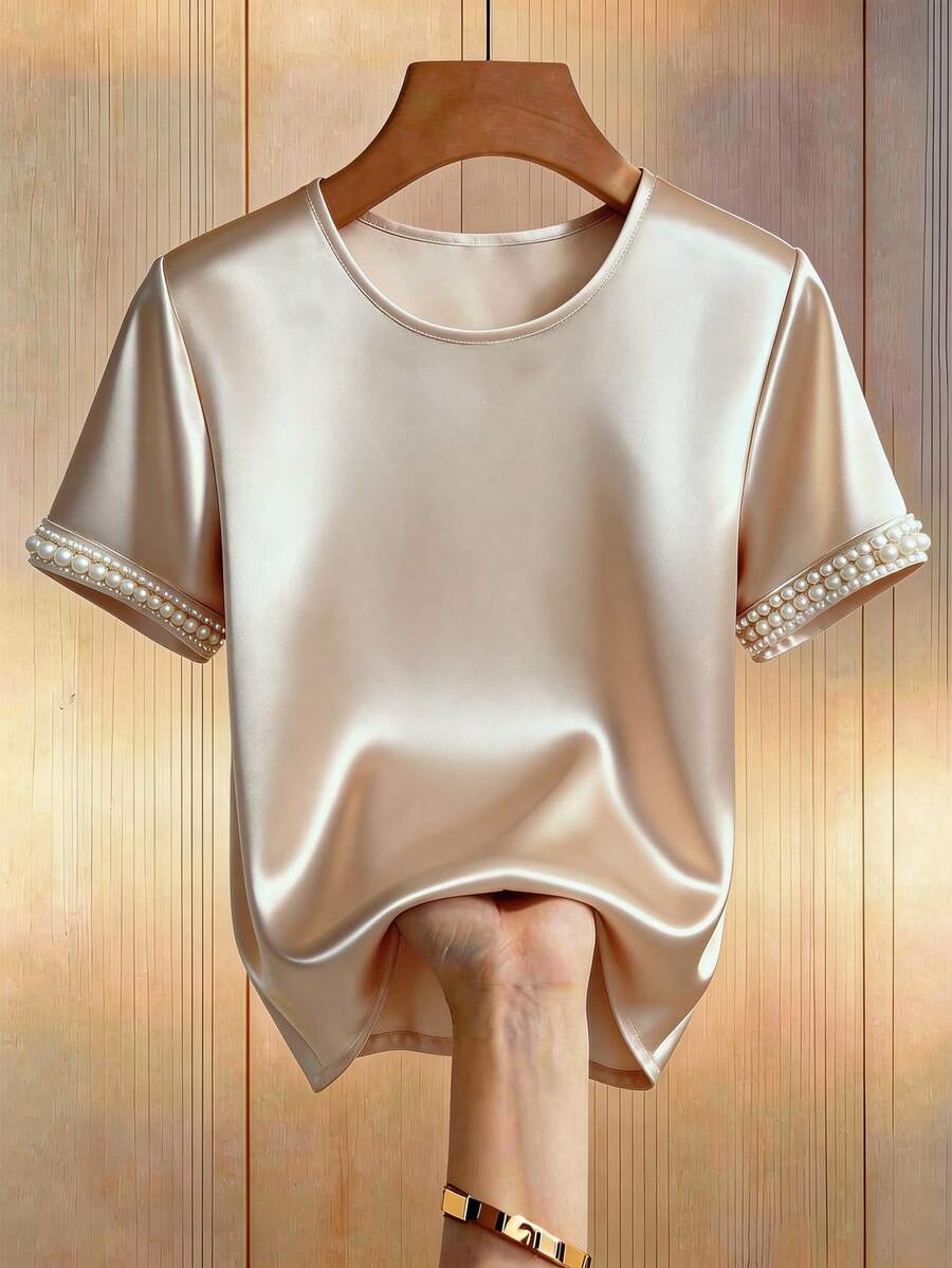 Franclia Áo sơ mi nữ cổ tròn tay ngắn dáng rộng thanh lịch và thoải mái, đính ngọc trai, chất liệu satin, thích hợp mặc hàng ngày/dịp Tết Dương lịch/công sở/đi làm/kỳ nghỉ thư giãn. Áo nữ thanh lịch đính ngọc trai, áo kiểu sang trọng, áo nữ tính, áo lụa cho nữ, áo lụa thanh lịch, áo satin cho nữ, áo thun satin, áo thun lụa, áo tay ngắn cho nữ, áo kiểu cho nữ. - Rượu sâm banh - Xem 1