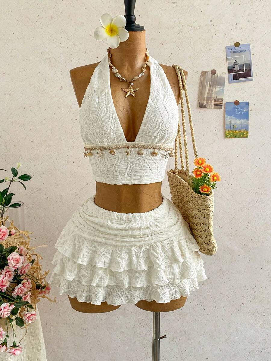 Soleia Bộ đồ 2 món dành cho nữ, gồm áo croptop cổ yếm viền sao biển và chân váy xếp tầng. - trắng - Xem 1