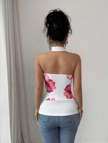 SHEIN Elenzya Áo croptop không tay dây mảnh màu trắng họa tiết hoa mới năm 2026, phong cách retro Mỹ, phù hợp cho mùa hè, áo vest ôm dáng đa năng cho nữ. Áo camisole hở lưng dây mảnh kiểu dáng châu Âu và Mỹ mới năm 2026 với trang trí vòng kim loại, phù hợp cho phụ nữ từ 20-35+ tuổi, mặc thường ngày, đi nghỉ mát, hẹn hò, dự tiệc, ngày Valentine (Họa tiết ngẫu nhiên). - trắng - Xem 2
