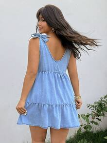 GalTyme 夏季大码无袖休闲牛仔连衣裙，适合夏季嘉年华、通勤、度假、毕业典礼等场合，时尚百搭，充满Y2K风格，可爱街头风，适合派对、婚礼、商务休闲、海滩、毕业典礼、复活节等各种场合。这款浅色水洗牛仔A字迷你连衣裙，饰有层叠荷叶边和系带肩带，尽显优雅气质。此外，还有一款大码水洗牛仔层叠荷叶边迷你连衣裙，配有系带肩带，打造休闲夏日风情。 - 藍色 - 查看 2