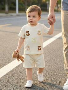 Souflis Souflis 男婴卡通熊刺绣圆领短袖上衣搭配纯棕色短裤，风格活泼，适合日常穿着、户外活动和舒适的居家穿着，轻松打造可爱的儿童装扮。 - 杏色 - 查看 4