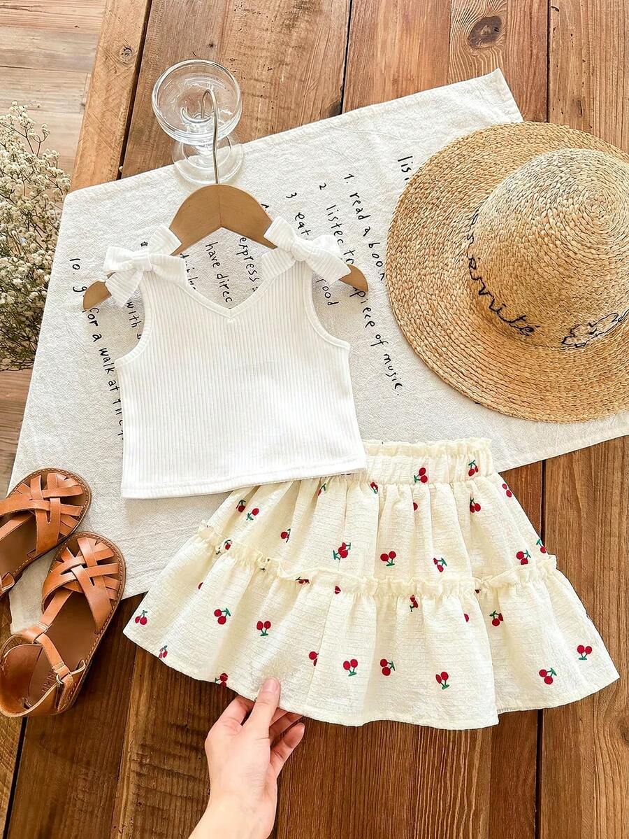 SHEIN LMoss Kids LMoss 女婴针织纯色吊带背心 + 印花雪纺迷你裙两件套 女婴罗纹上衣 女婴夏季裙装套装 女婴裙装套装 樱桃印花裙 女婴夏季服装 女婴春季服装 夏季套装 - 彩色 - 查看 1