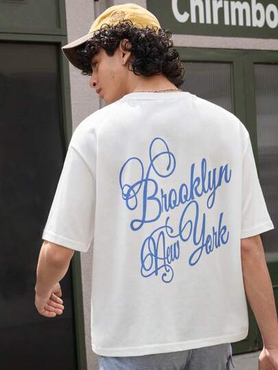 Open Phase 一件男女皆宜的都市时尚T恤，舒适的白色T恤，印有布鲁克林字母图案，适合休闲和街头风格。