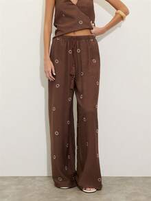 Nöista Two Pieces Set With A Halter V-Neck Top And Matching Wide-Leg Pants In Textured Brown Fabric With Sun Embroidery. . Perfect For Travel, Weekends, And Summer Days, Vacation Outfit, Boho, Festival, Spring, Holiday Look. - Brown - View 4