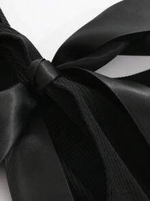 Joudiya تي شيرت نسائي ضيق بأكمام قصيرة مع تصميم ظهر مكشوف وأشرطة فيونكة علوي معلق - الأسود - مشاهدة 6