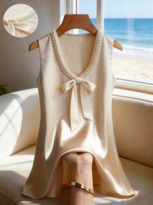 Franclia Women's Elegant Casual 2026 Spring/Summer Satin Pearl Collar Bow Loose Mini Dress Pearl Top Satin Top Creme Top Sleeveless Top Beaded Neckline Cream Top Ivory Top Pearl Top Women Women Tops Elegant Bow Top Pearl Dress Dress Top - Champagne - View 1